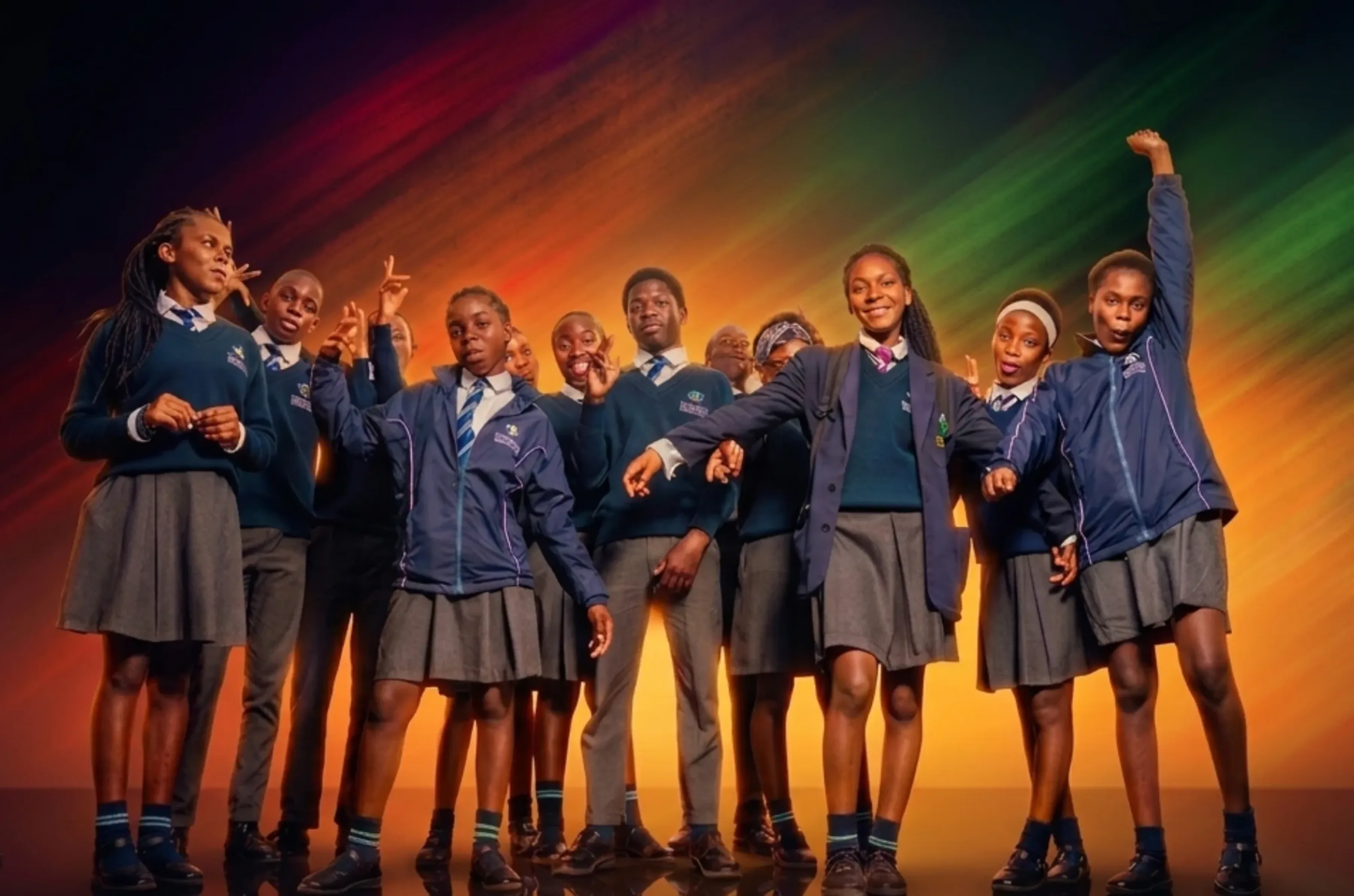 Image of happy, energetic students both female and male from Zambia with arty backdrop