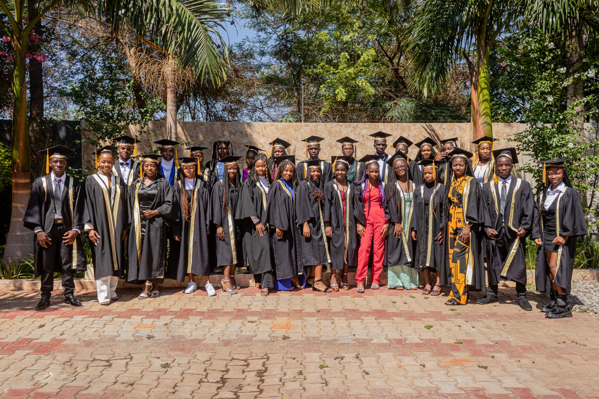 Pestalozzi International Zambia Graduation 2024 group picture, all in their graduation outfit