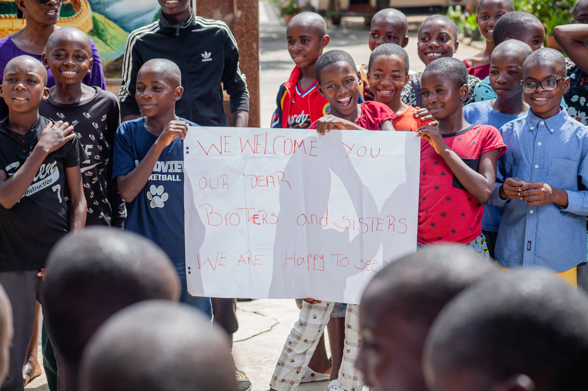 Scholars welcoming new students to Pestalozzi school Zambia