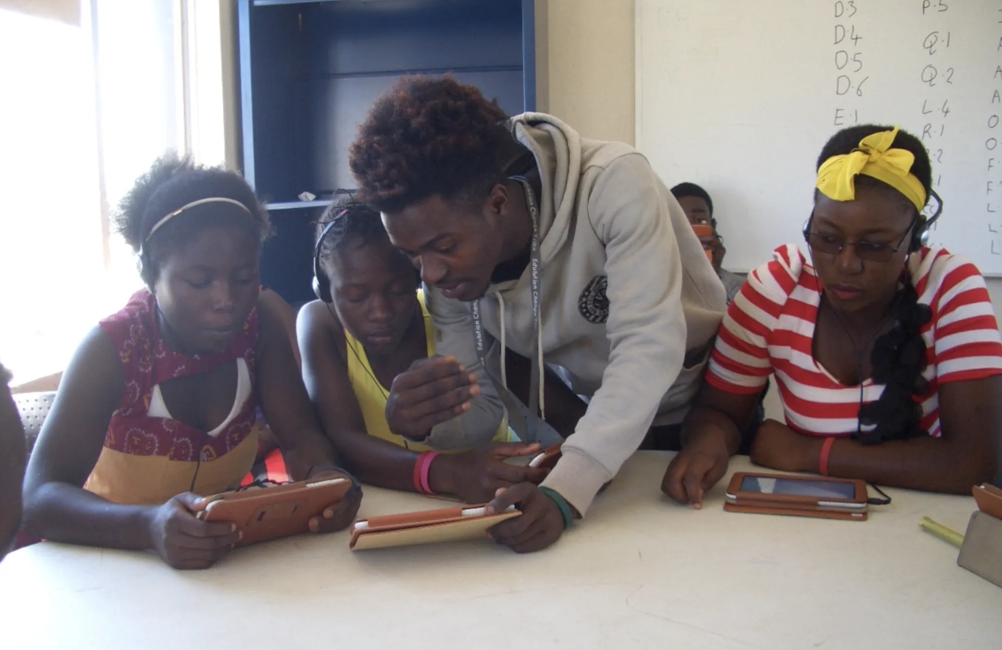 Young people learning with tablets in the Edulution programme Zambia