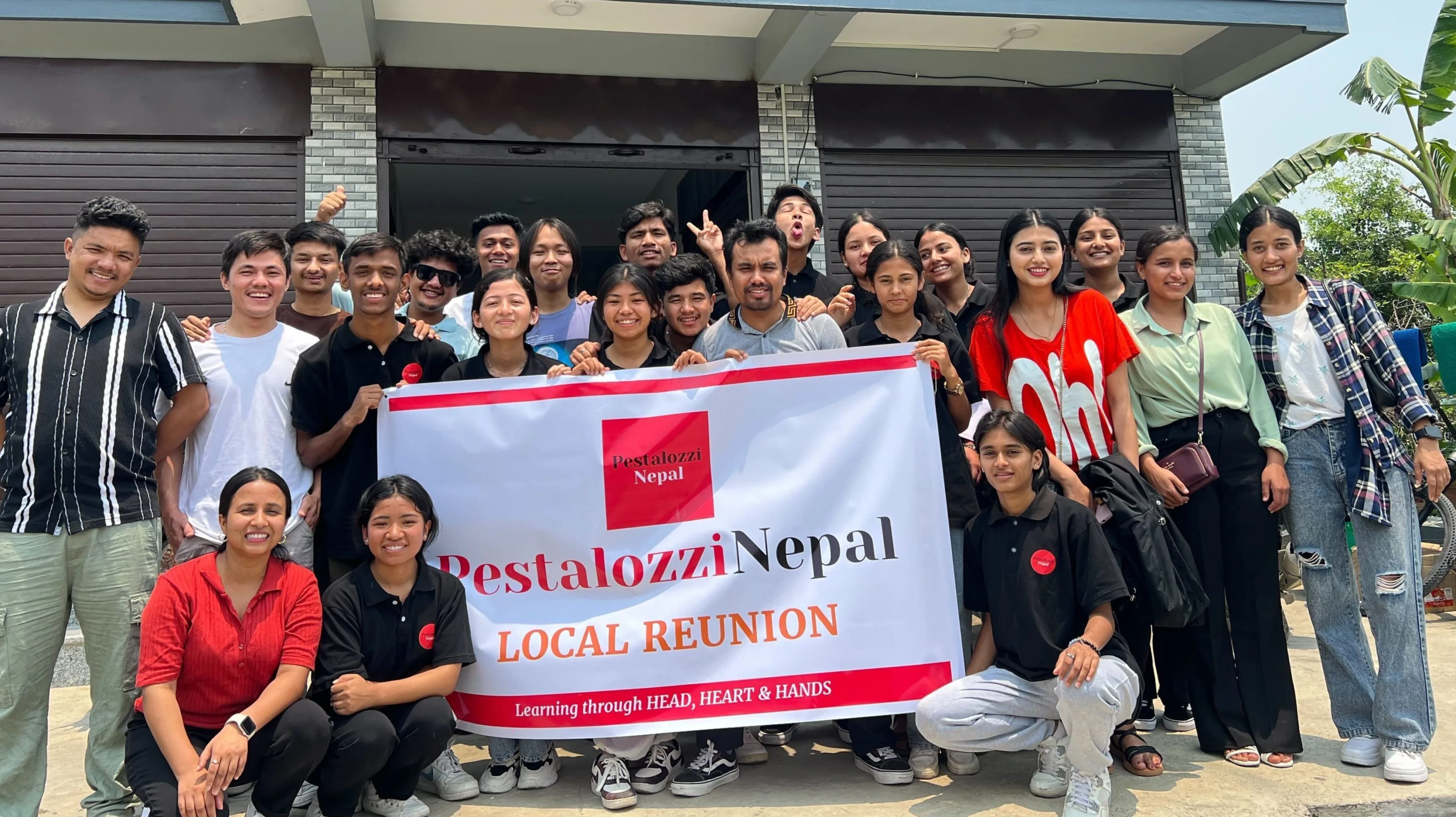 A Group of Pestalozzi International Nepal Alumni in a group picture