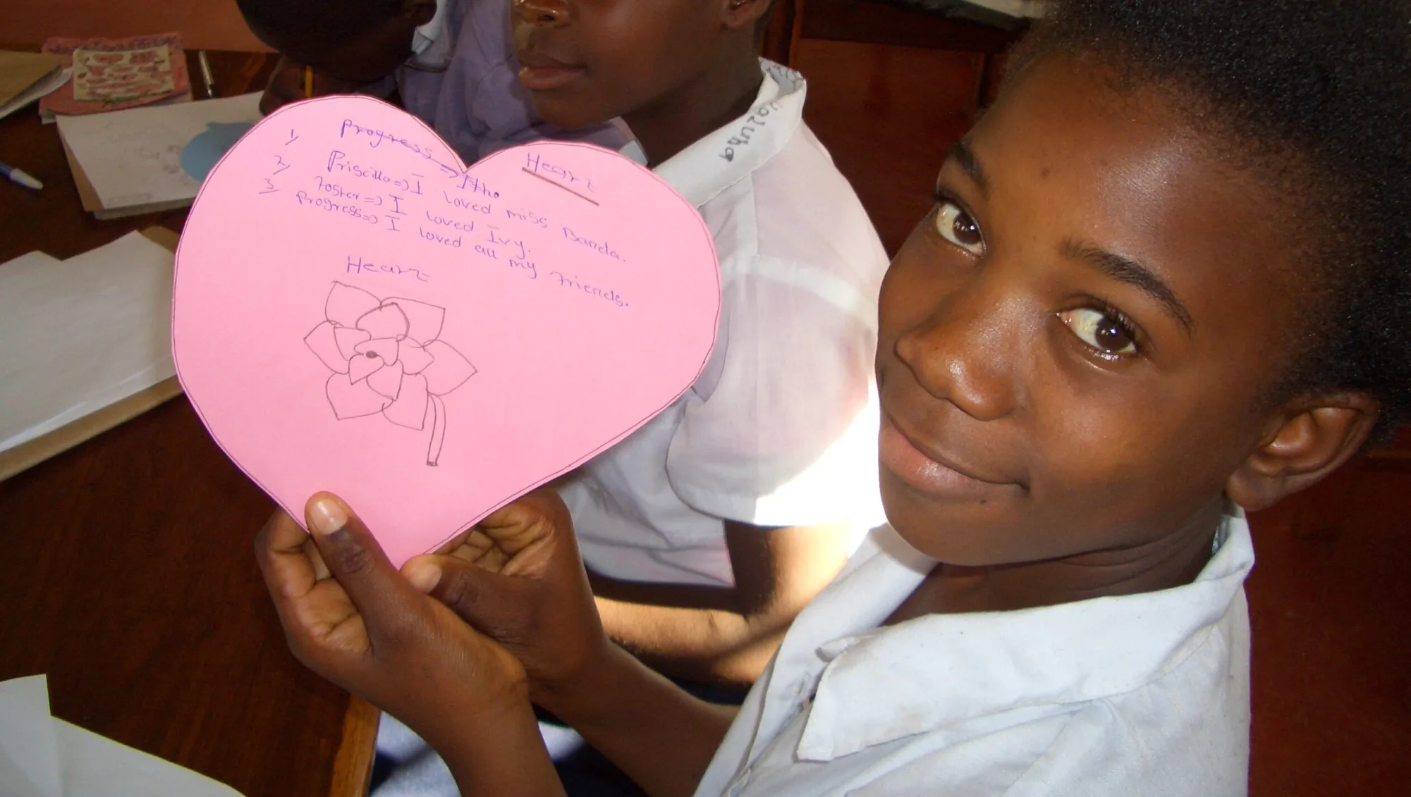 Students in Zambia participating in Head, Heart, Hands activity