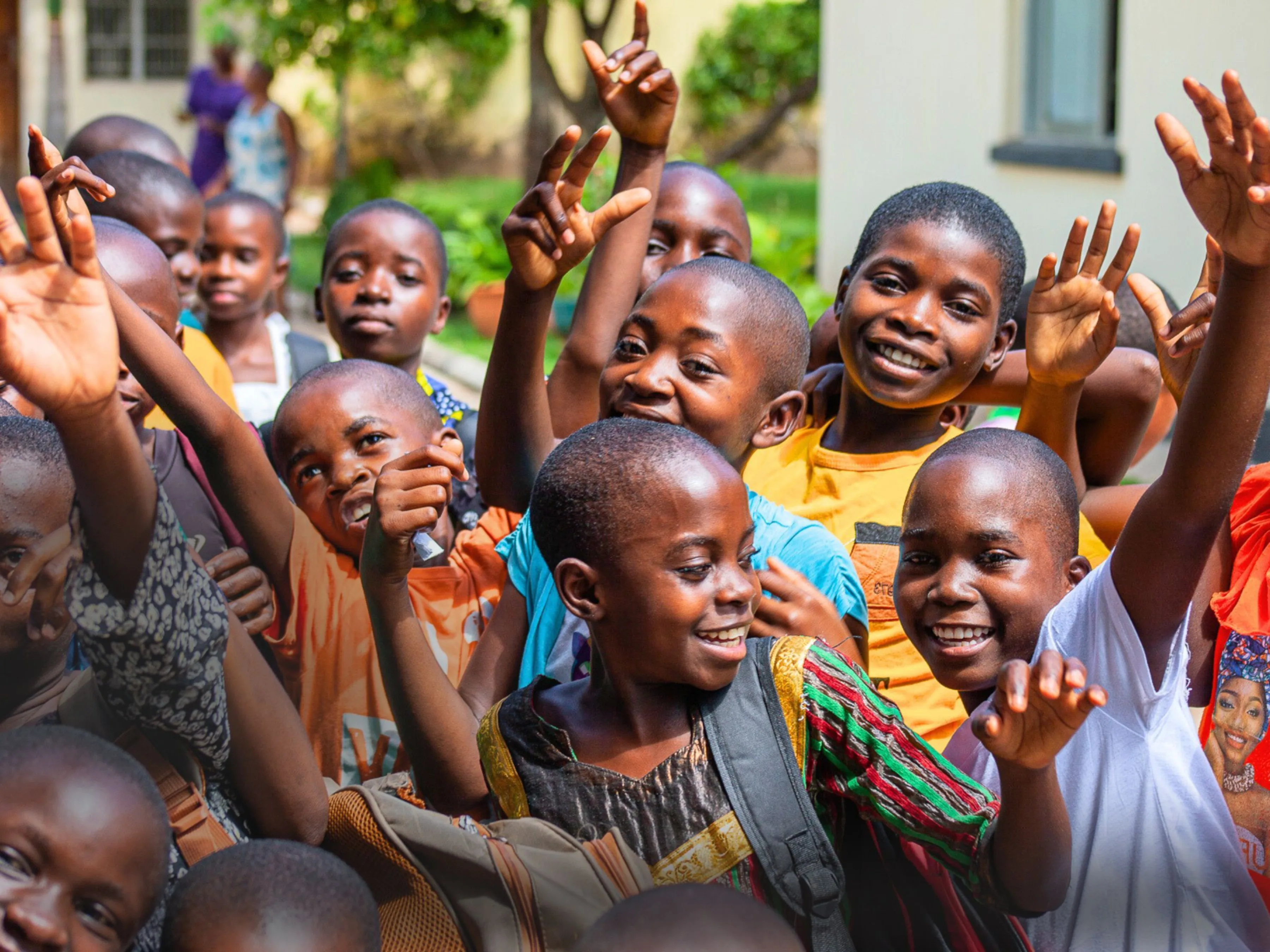 Images of students in Zambia welcoming new students in Zambia